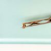 Picture of Late Edwardian Era 10K Yellow Gold, Seed Pearl & Garnet Bar Brooch by Ostby Barton