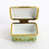 Picture of Halcyon Days for the Smithsonian Enameled Easter Box Featuring Bunnies on a Tandem Bicycle