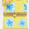 Picture of Limoges Porcelain Cat in Shopping Bag Trinket Box by Artoria