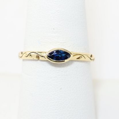 Picture of 14k Yellow Gold Curved Oval Blue Sapphire Ring