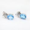 Picture of 14k White Gold Oval Topaz & Diamond Earrings