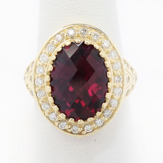 Picture of 14k Yellow Gold Oval Garnet & Diamond Halo Ring